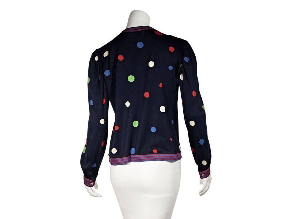 Product details:  Vintage multicolor polka-dot cotton cardigan by Leonard Paris.  V-neck.  Long sleeves.  Single button cuffs.  Button-front closure.  42