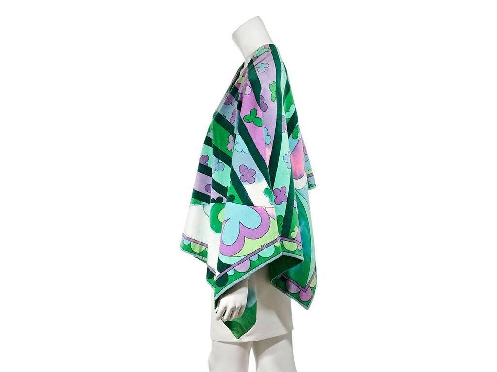 Product details:  Vintage multicolor printed cotton cover-up by Emilio Pucci.  V-neck.  Asymmetrical hem.  Pullover style.  36