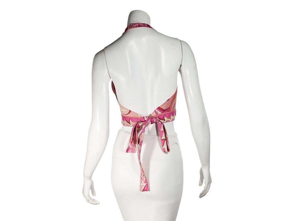 Product details:  Vintage pink swirl-printed cotton-blend halter top by Emilio Pucci.  Scoopneck.  Sleeveless.  Self-tie back closure.  Cropped hem.  27
