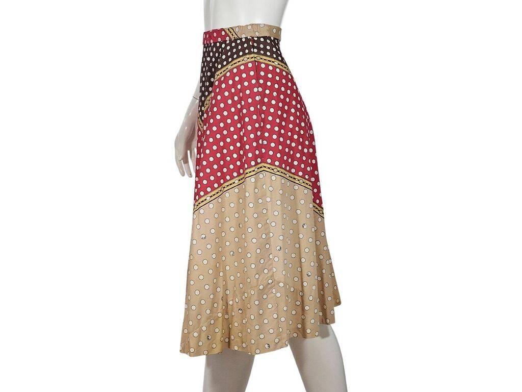 Product details:  Vintage multicolor polka-dot printed cotton skirt by Emilio Pucci.  Elasticized waist with button and hook closure.  24