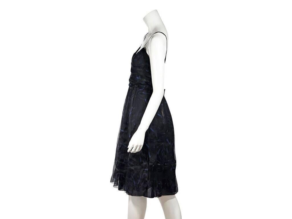 Product details:  Black and blue printed silk party dress by Celine.  Sleeveless.  Concealed back zip closure.  Pleated skirting.  Label size FR 38.  32