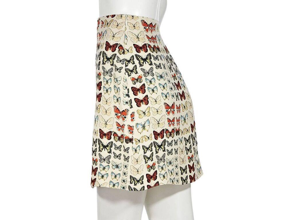 Product details:  Vintage multicolor butterfly-printed mini skirt by Gianni Versace.  High-rise waist.  Concealed size zip closure.  EU size 40.  28