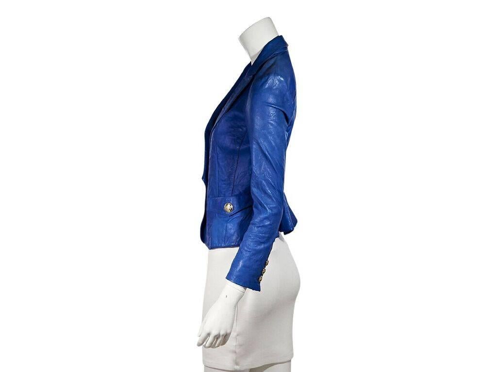 Product details:  Blue leather blazer by Emilio Pucci.  Notched lapel.  Long sleeves.  Three-button detail at cuffs.  Single-button closure.  Waist slide button-flap pockets.  Goldtone hardware.  34
