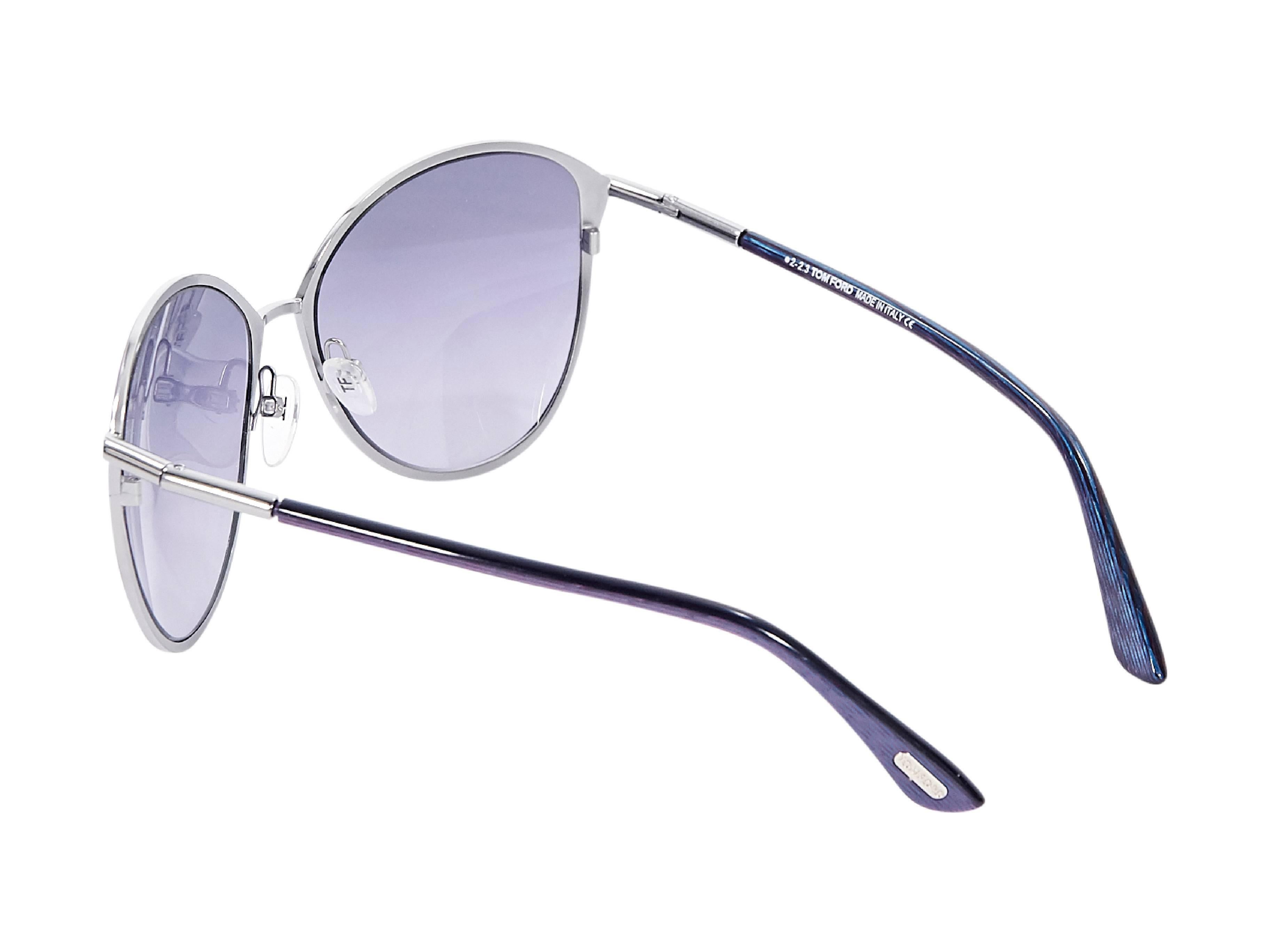 Product details:  Purple oversized Penelope sunglasses by Tom Ford.  Cushioned nose pads.  Gradient lenses.  Silvertone hardware.  Case included.  2.5