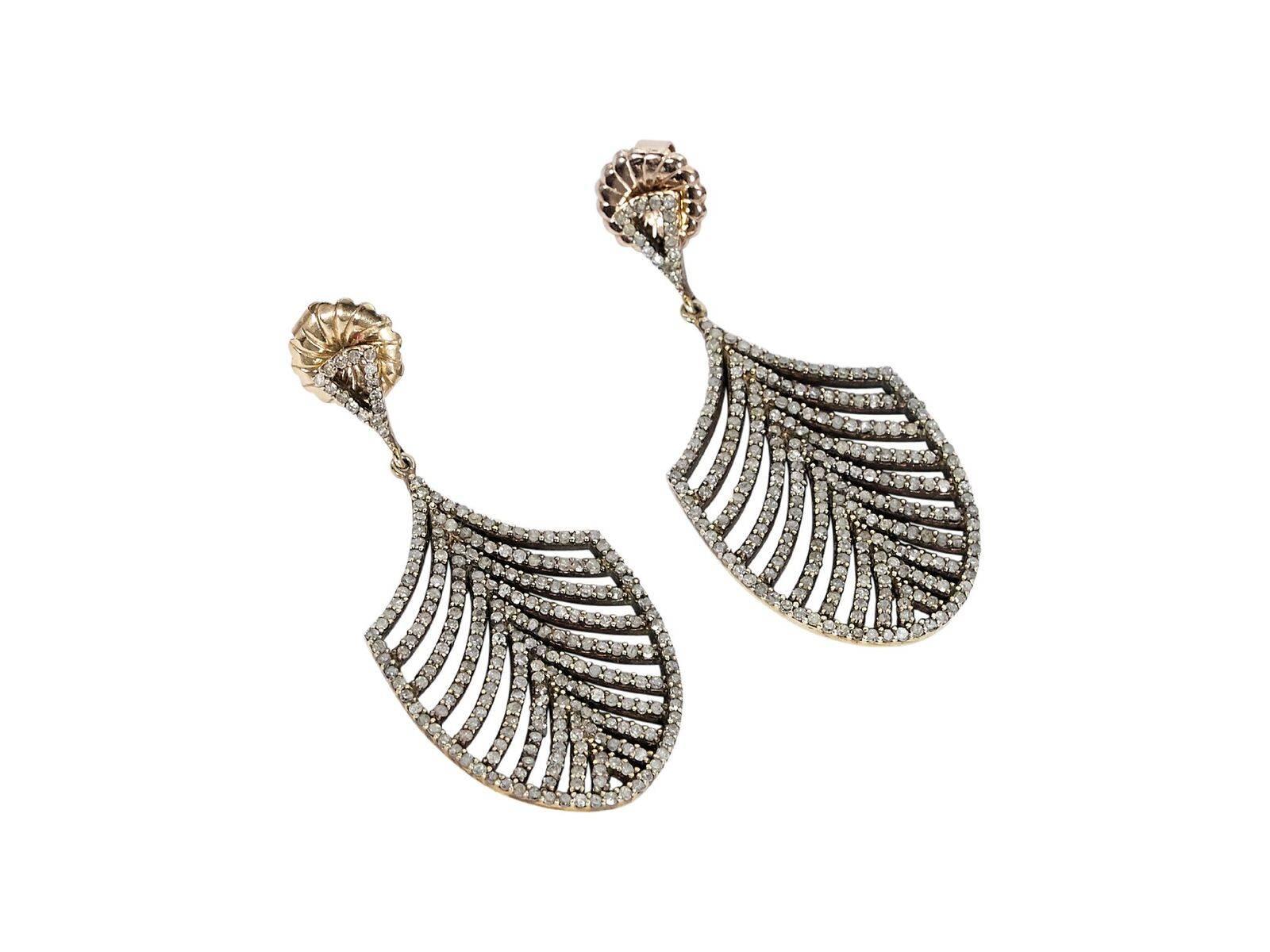 Product details:  Diamond-encrusted feather drop earrings by Jennifer Miller.  Post closure.  Goldtone hardware.  1.25