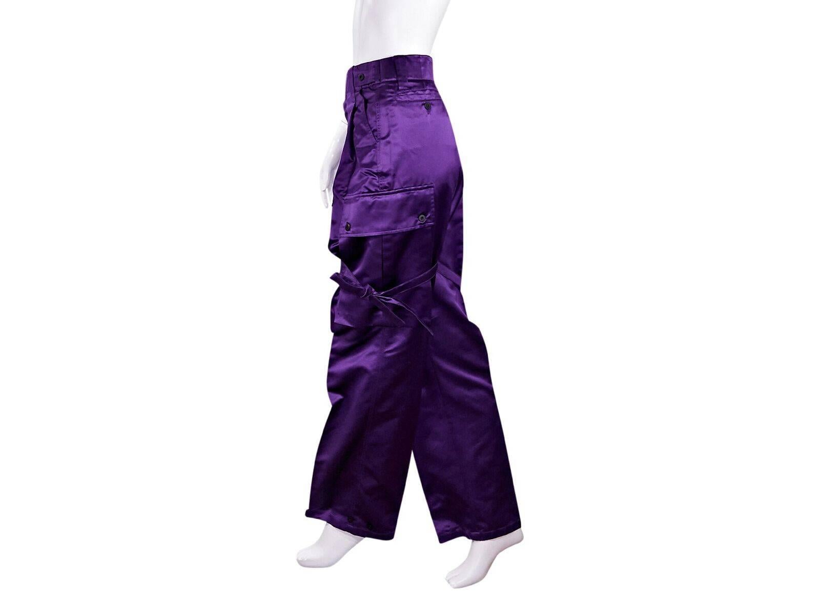 Product details:  Vintage purple silk-blend cargo pants by Gucci.  From the Tom Ford era.  Looped waist.  Concealed hook and zip fly closure.  Waist slide pockets.  Button flap cargo pockets.  Back button besom pocket.  Label size IT 40.  30