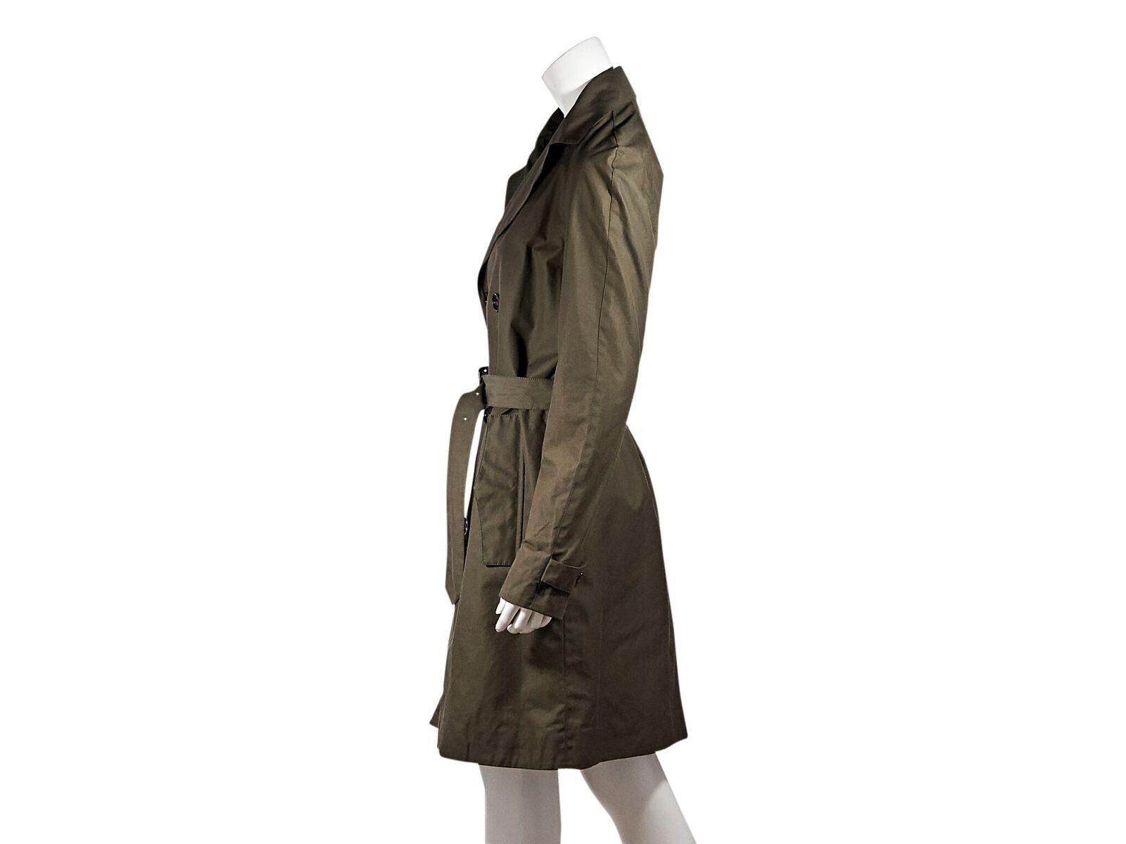 Product details:  Olive green trench coat by Burberry Prorsum.  Notched lapel.  Long sleeves.  Double-breasted button-front closure.  Adjustable belted waist.  Waist snap flap pockets.  Back center hem vent.  38