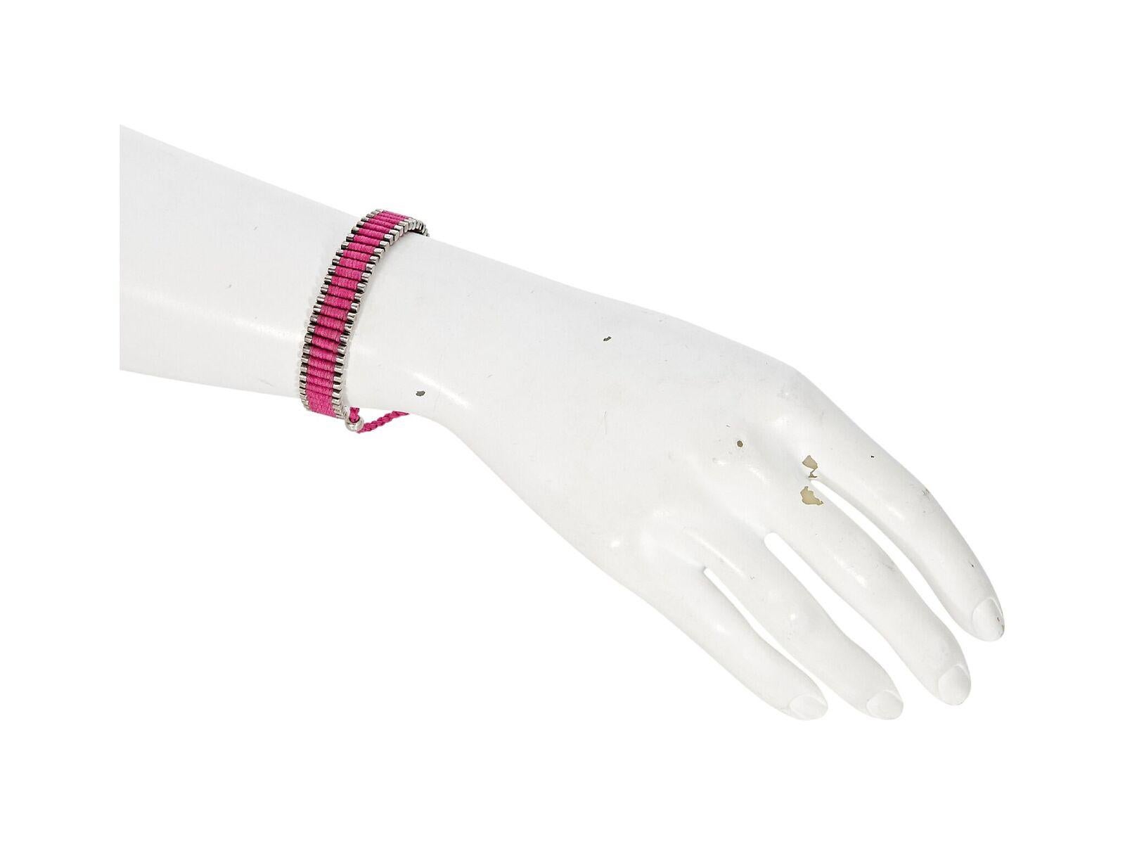 Product details:  Pink woven Friendship bracelet by Links of London.  Adjustable pull closure.  Silvertone hardware.  Up to 9.5