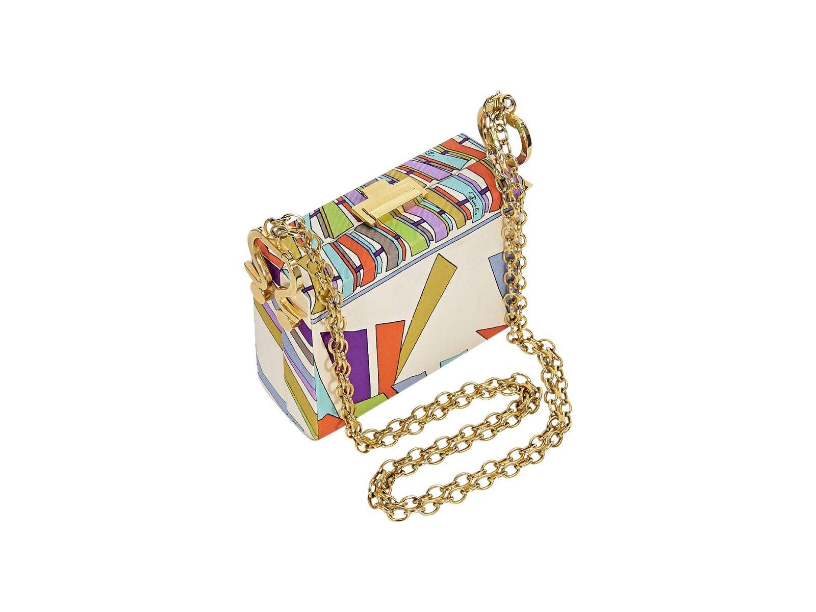 Product details:  Multicolor printed small box crossbody bag by Emilio Pucci.  Chain crossbody strap.  Top clasp closure.  Leather interior with inner slide pocket.  Protective metal feet.  Goldtone hardware.  
Condition: Pre-owned. Good. Small