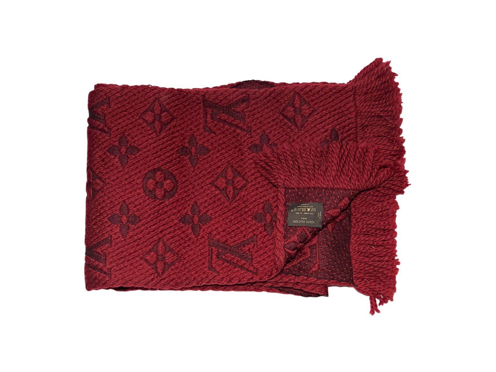 Product details:  Red wool logomania scarf by Louis Vuitton.  Fringed trim.  65