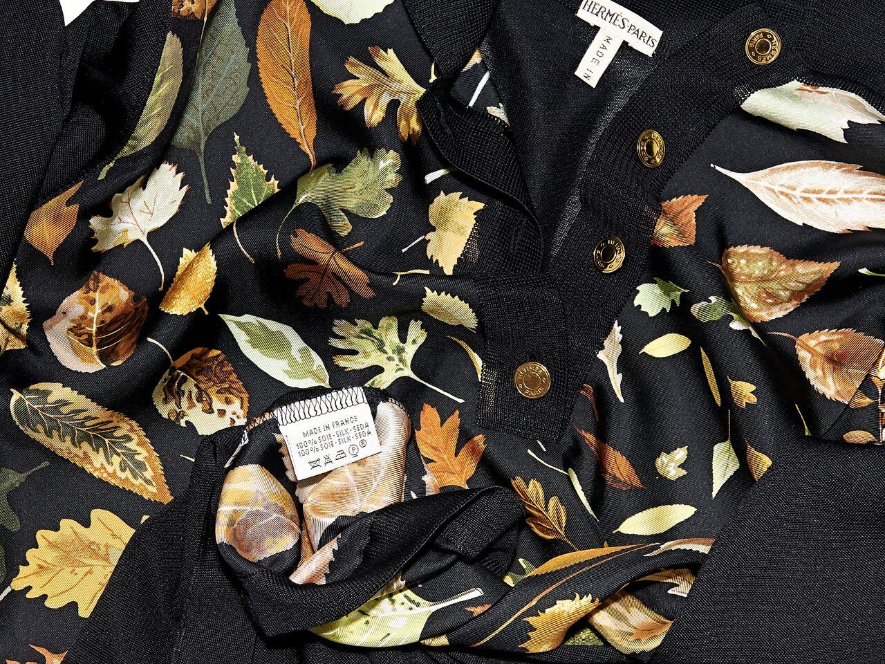Product details:  Multicolor leaf-printed silk-front polo by Hermes.  Spread collar.  Long sleeve.  Pullover style. 38
