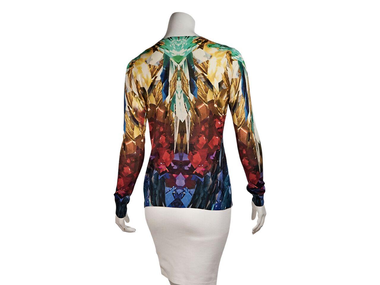 Product details:  Multicolor printed cardigan by Alexander McQueen.  Deep v-neck.  Long sleeves.  Button-front closure.  33