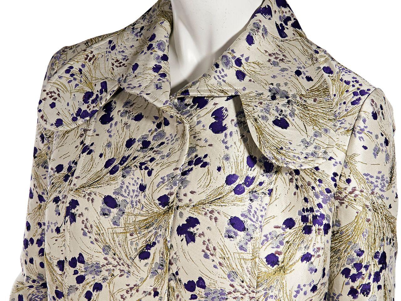Product details:  Multicolor floral brocade jacket by Giambattista Valli.  Oversized spread collar.  On-seam slide front pockets.  Concealed front closure.  34