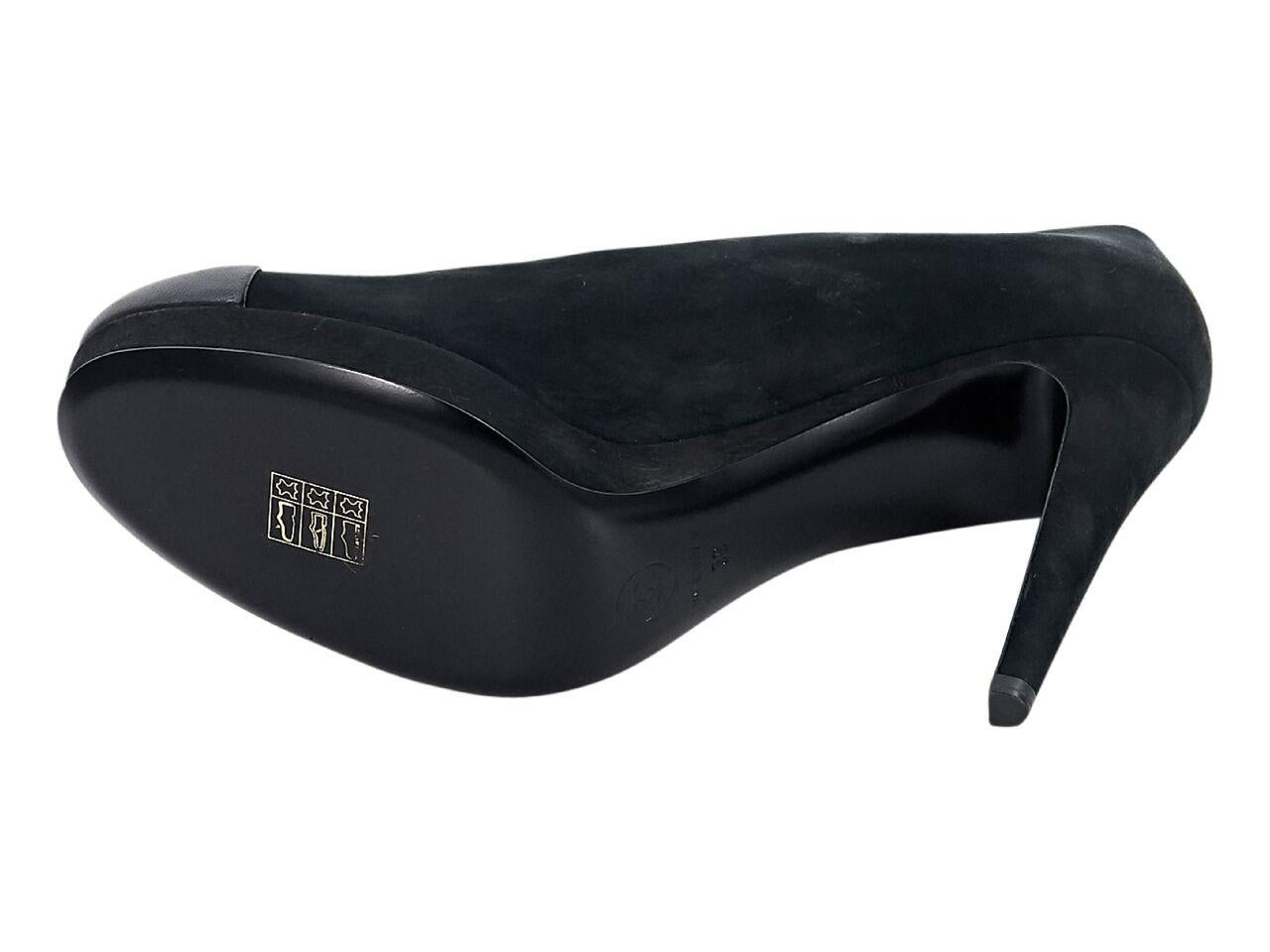 Product details:  Black suede platform pumps by Chanel.  Round leather cap toe.  Slip-on style.  4