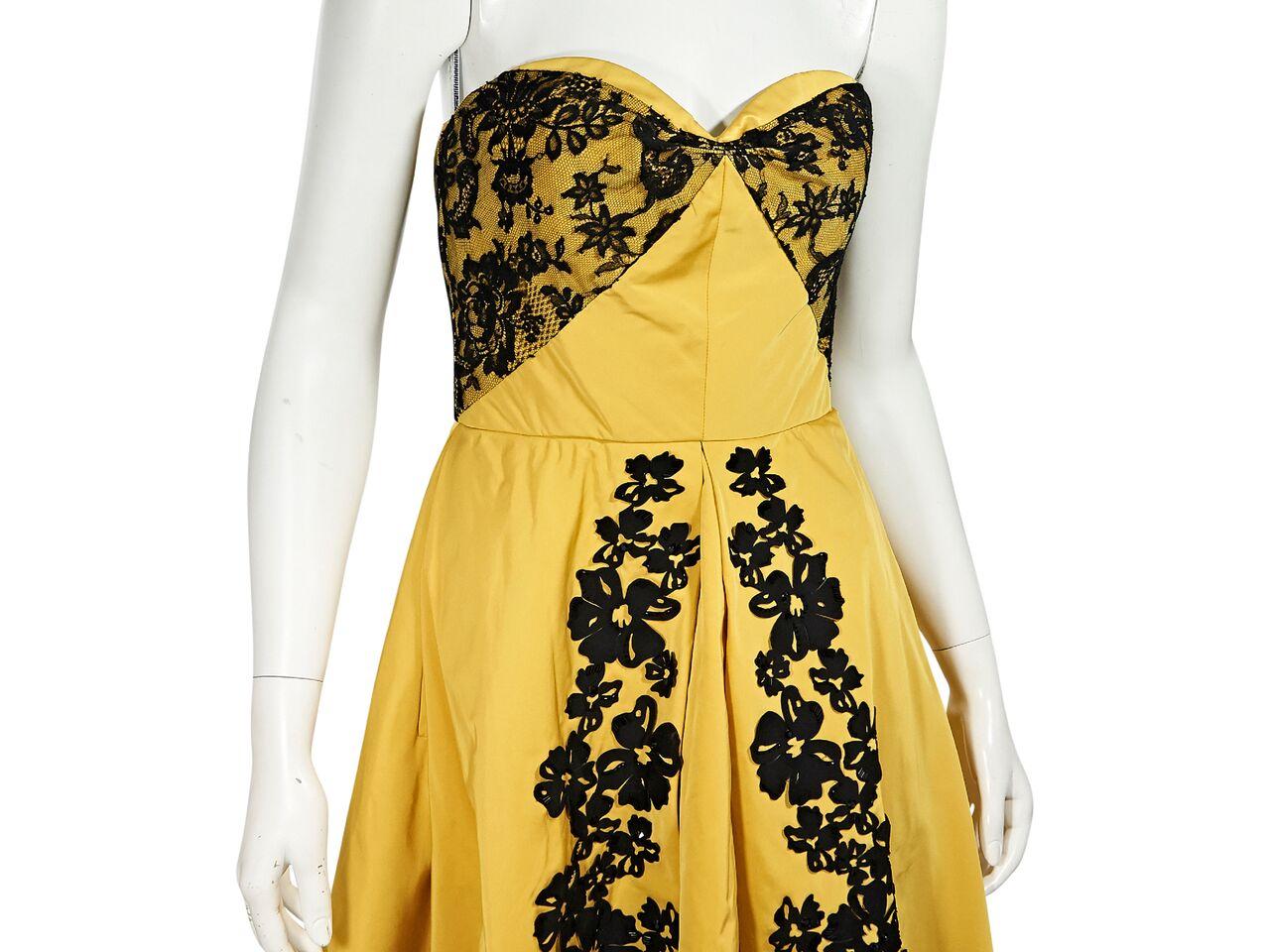 yellow strapless gown