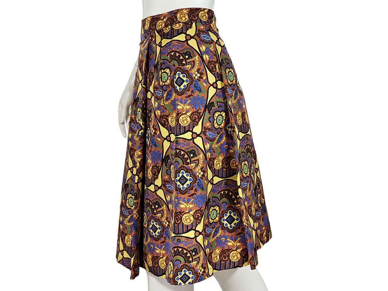 Product details:  Multicolor printed silk A-line skirt by Prada.  Banded waist.  Pleated design.  Concealed back zip closure.  Label size IT 42. 
Condition: Pre-owned. Very good. 
Est. Retail $ 895.00
