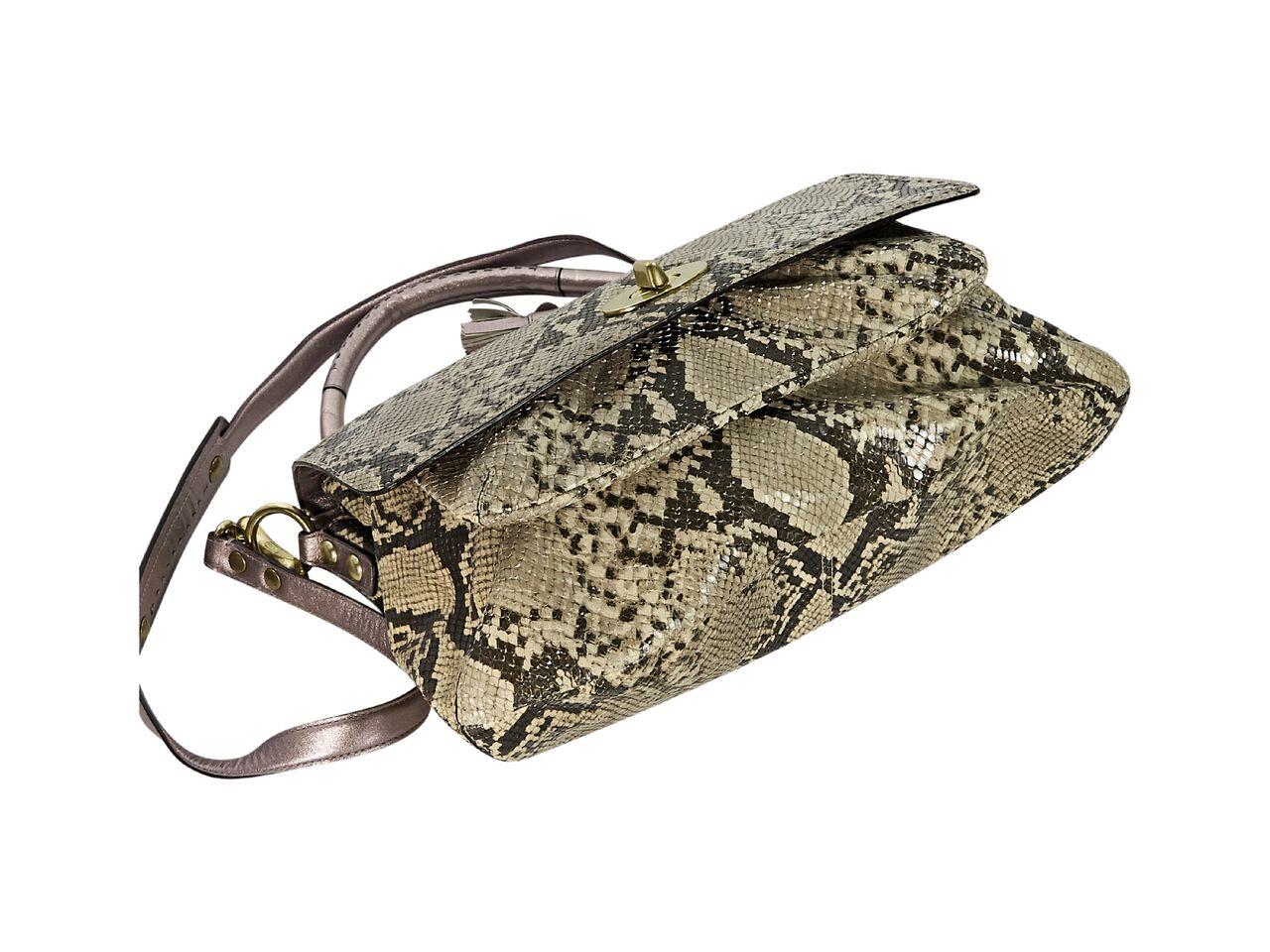 Product details:  Beige python shoulder bag by Coach.  Trimmed with metallic leather.  Top carry handle.  Detachable shoulder strap.  Front flap with twist-lock closure over front exterior pocket.  Lined interior with center zip compartment and