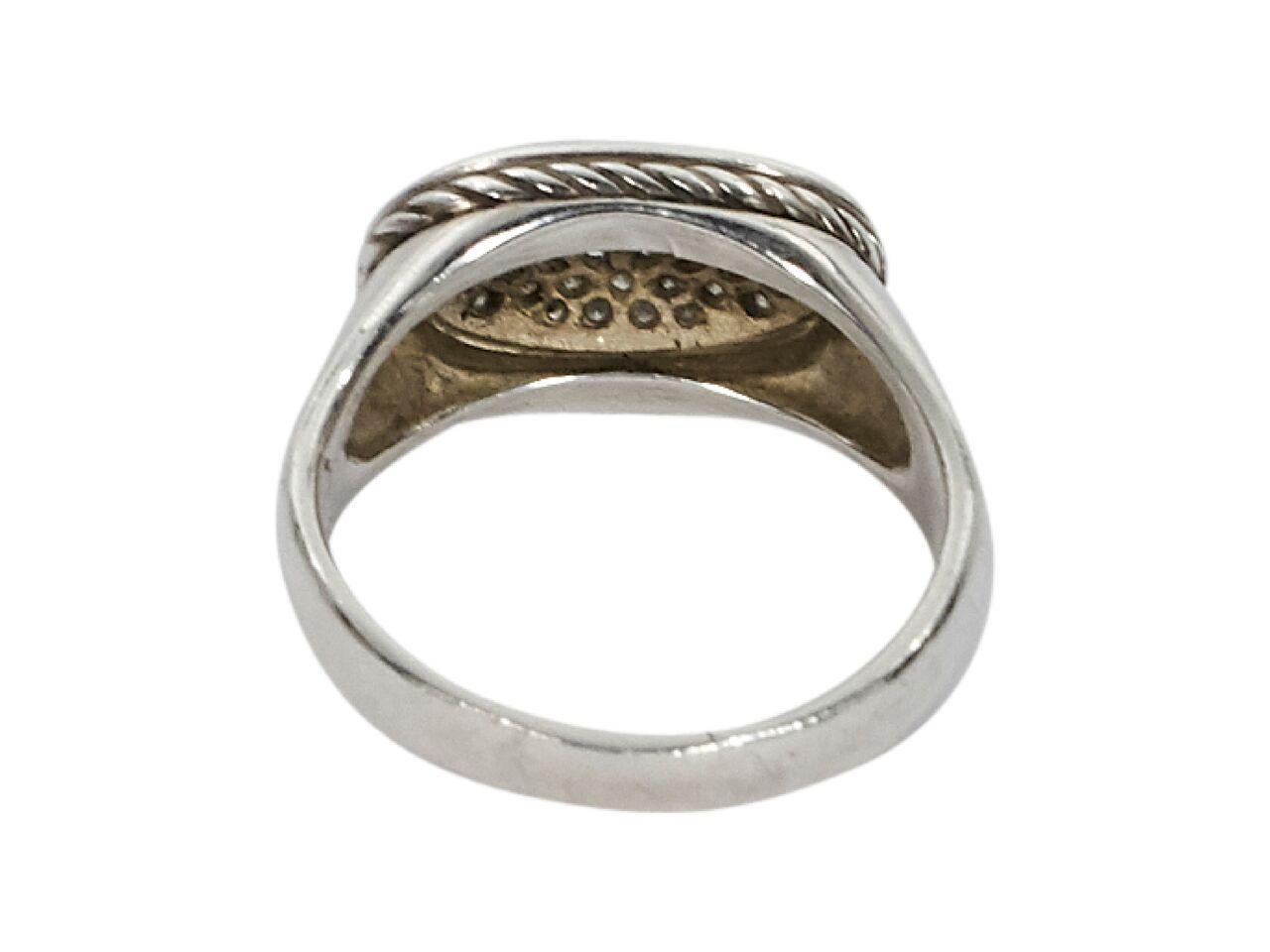 Product details:  Sterling silver oval cocktail ring by David Yurman.  Pave diamond oval.   
Condition: Pre-owned. Very good. 