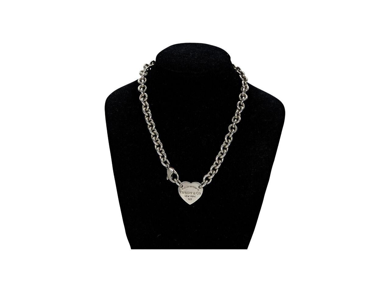 Product details:  Sterling silver heart chain necklace by Tiffany & Co.  Lobster clasp closure.  14