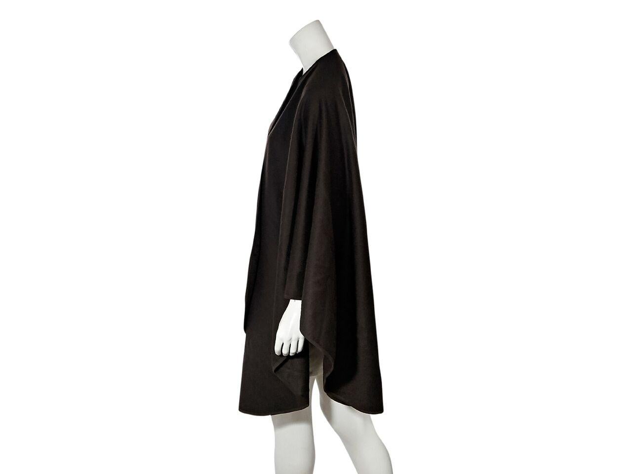 Product details:  Brown cashmere cape by Loro Piana for Bergdorf Goodman.  Trimmed with suede.  38