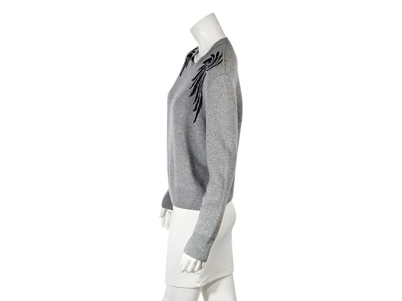 Product details:  Grey and black cashmere-blend sweater by Dries van Noten.  Crewneck.  Long sleeves.  Pullover style.  34