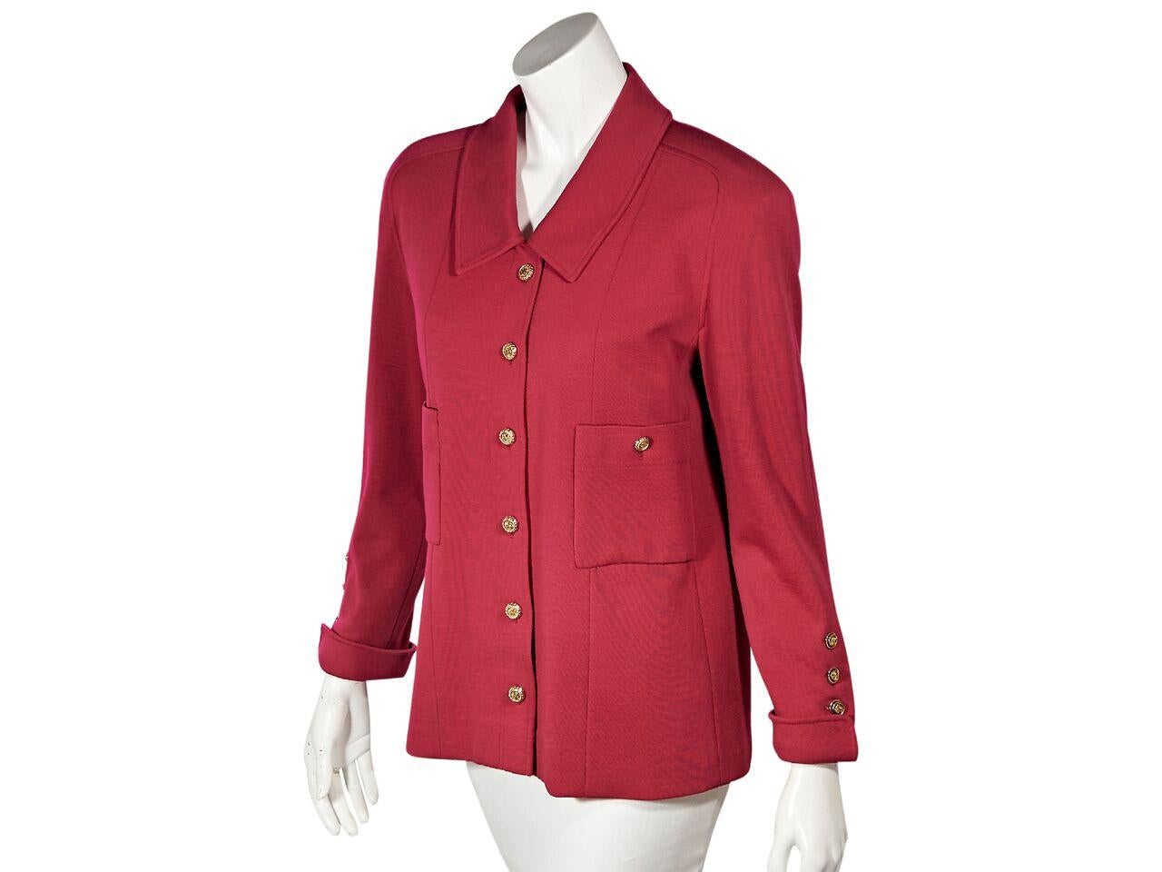 Product details:  Vintage hot pink jacket by Chanel.  Long sleeves.  Three-button detail at cuffs.  Button-front closure.  Button patch front pockets.  Goldtone hardware.  Bust 39.5