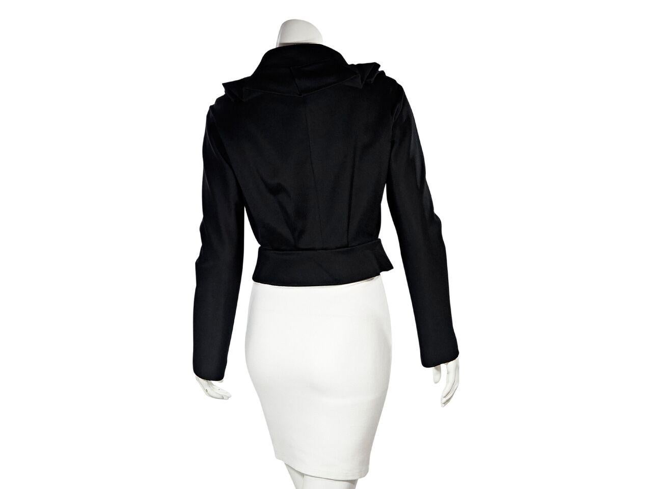 Product details:  Black fitted jacket by Balenciaga.  From the Nicholas Ghesquiere era.  Trimmed with ruffles.  Stand collar.  Long sleeves.  Concealed zip-front closure.  34