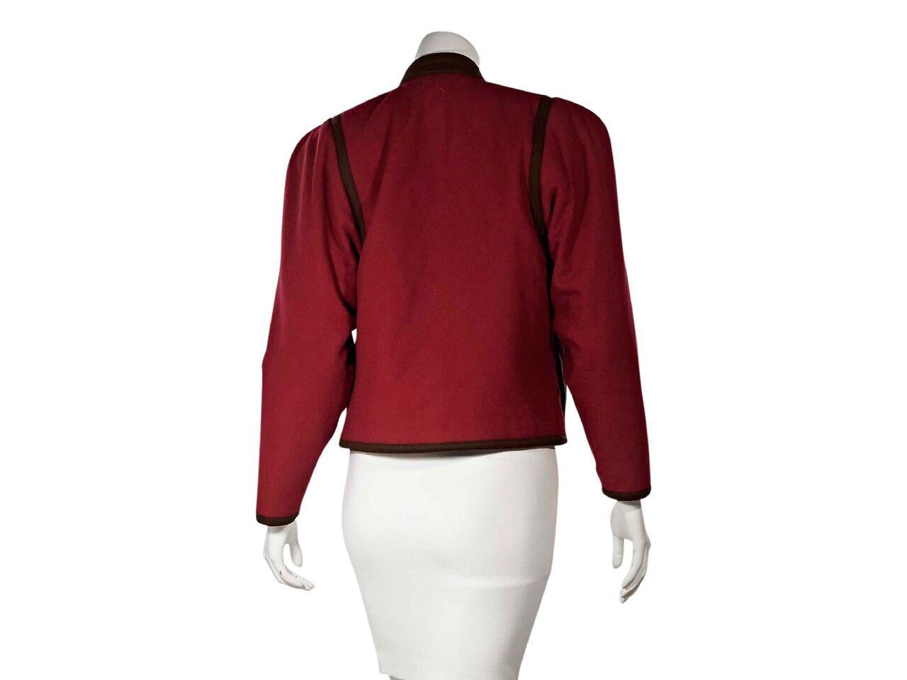 Product details:  Red and brown layered jacket by Gianni Versace.  Stand collar.  Long sleeves.  Concealed button-front closure.  Waist slide pockets.  32