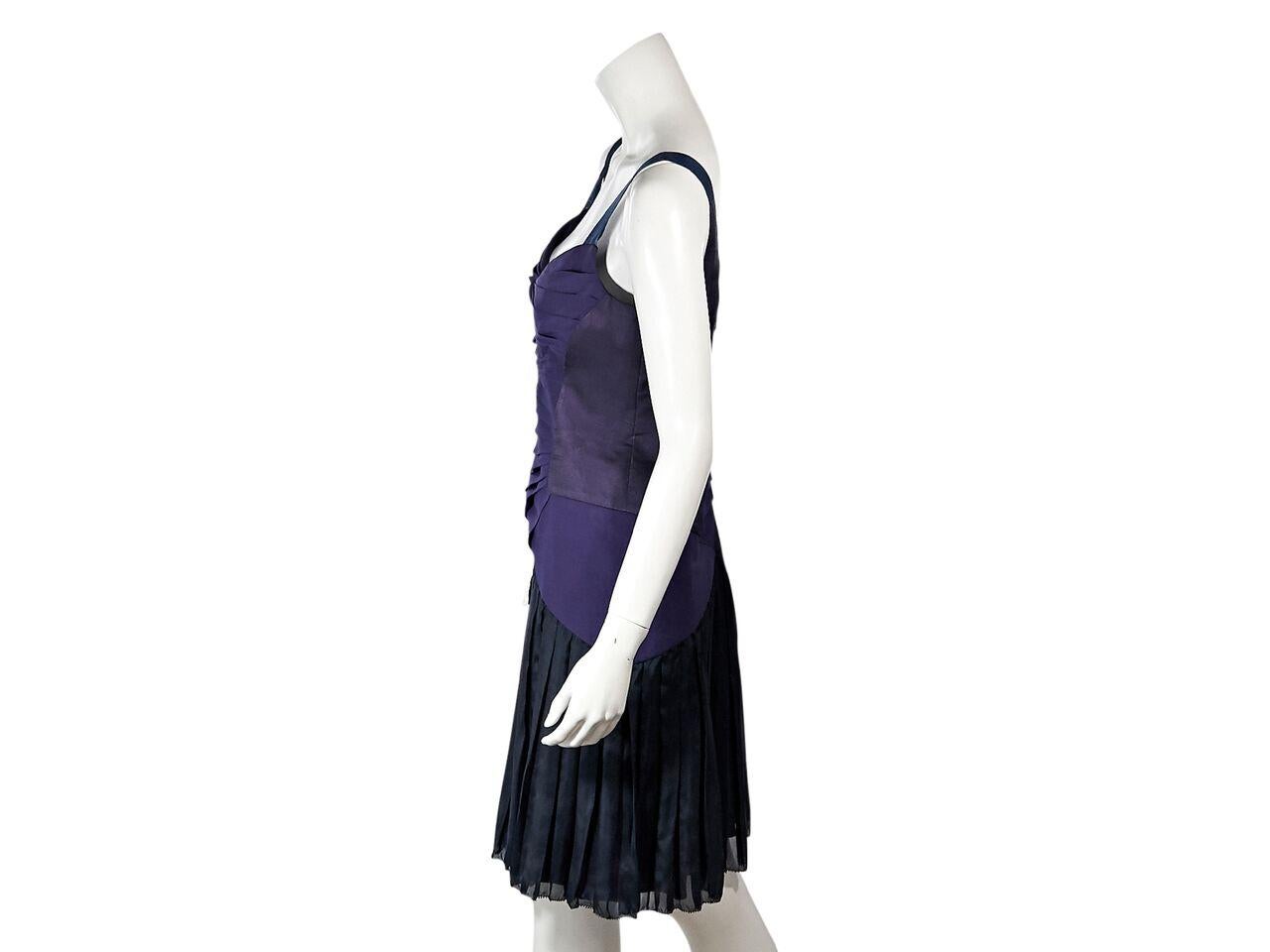 Product details:  Tonal purple pleated silk cocktail dress by Zac Posen.  Sweetheart scoopneck.  Sleeveless.  Concealed back zip closure.  38