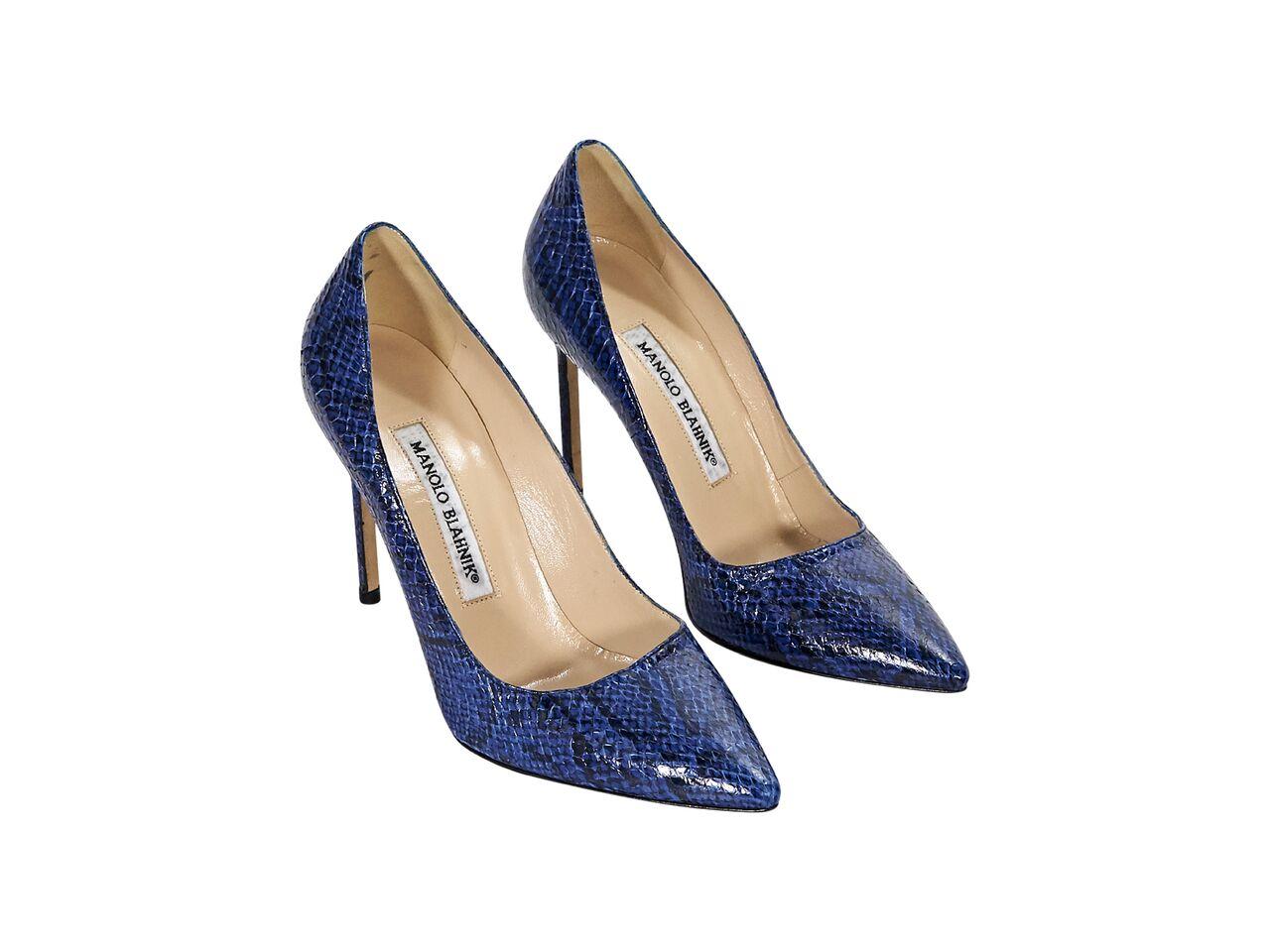 Product details:  Electric blue snakeskin pumps by Manolo Blahnik.  Point toe.  Slip-on style.  4