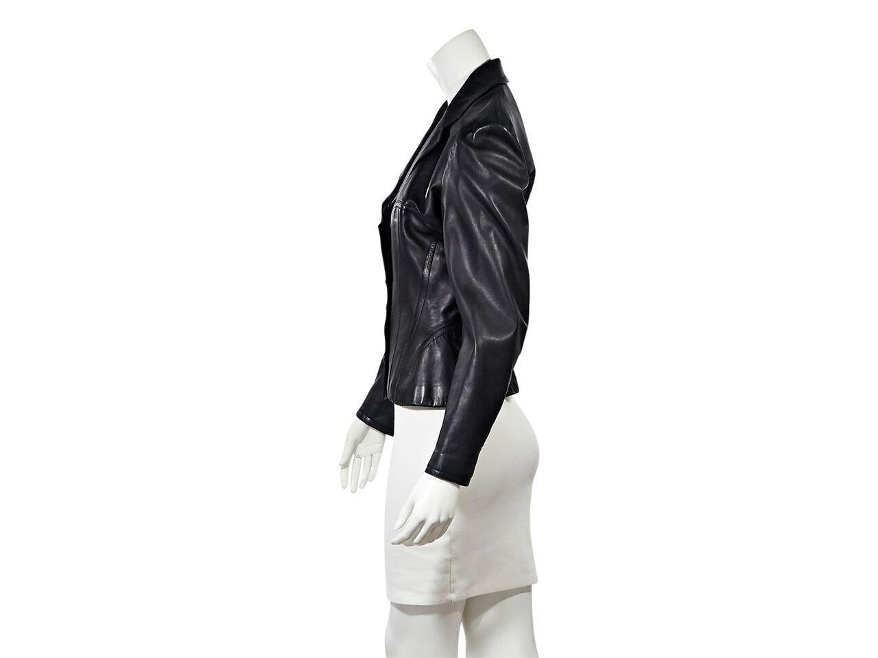 Product details:  Black leather tailored jacket by Alaia.  Circa the 1980s.  Notched lapel.  Long sleeves.  Button-front closure.  Faux corset bodice.  Silvertone hardware.  33
