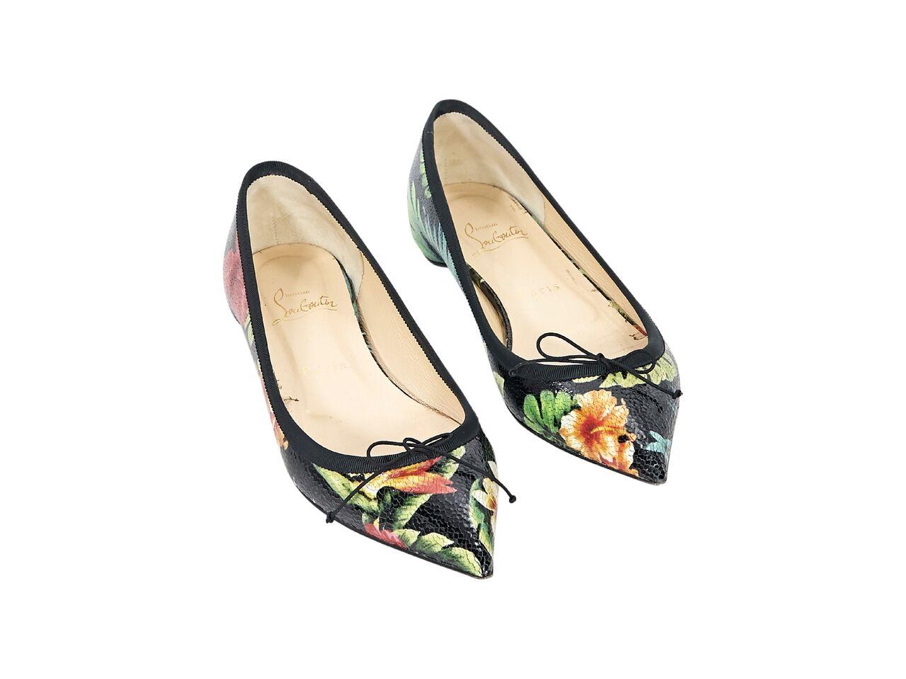 Product details:  Multicolor Hawaiian floral-printed patent leather Solasofia flats by Christian Louboutin.  Point toe.  Iconic red sole.  Slip-on style. 
Condition: Pre-owned. Very good. 
Est. Retail $ 995.00