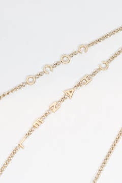 Chanel miniature Coco Chanel figurine necklace