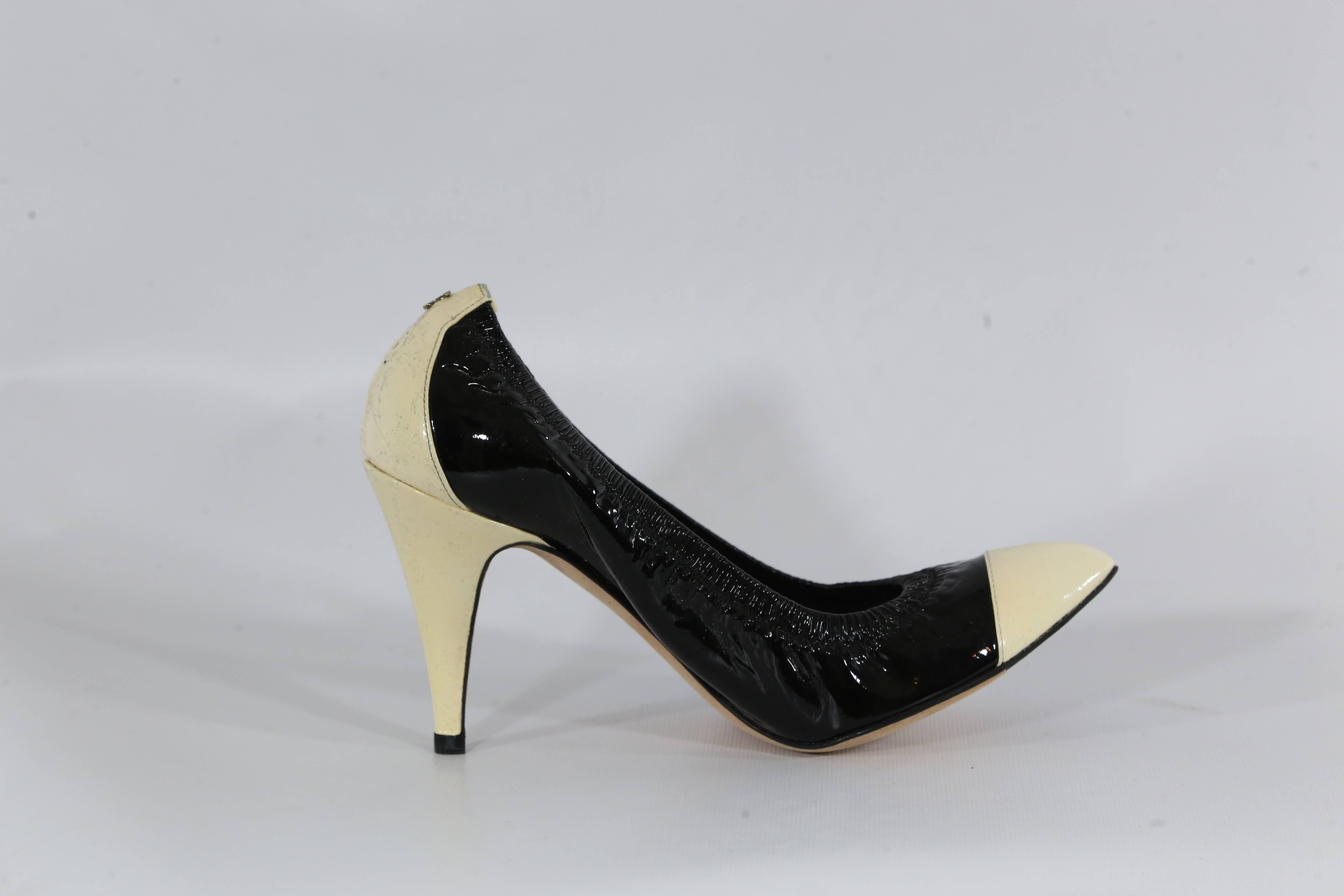 Women's Chanel Black Patent Leather and Ivory Pumps