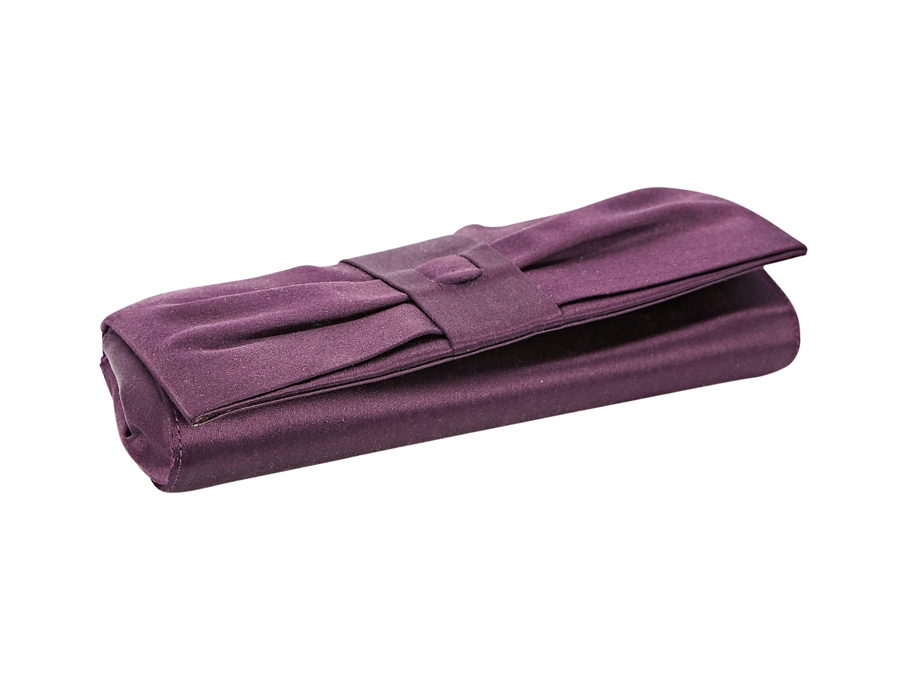 Purple pleated satin clutch by Valentino.  Front flap with hidden magnetic closure.  Lined interior with inner slide pocket.  9