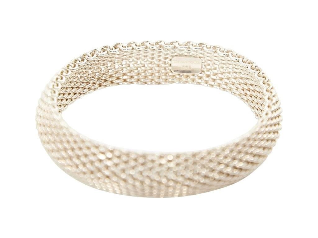 Product details:  Sterling silver mesh bangle by Tiffany & Co.  Slip-on style.
Condition: Excellent.  