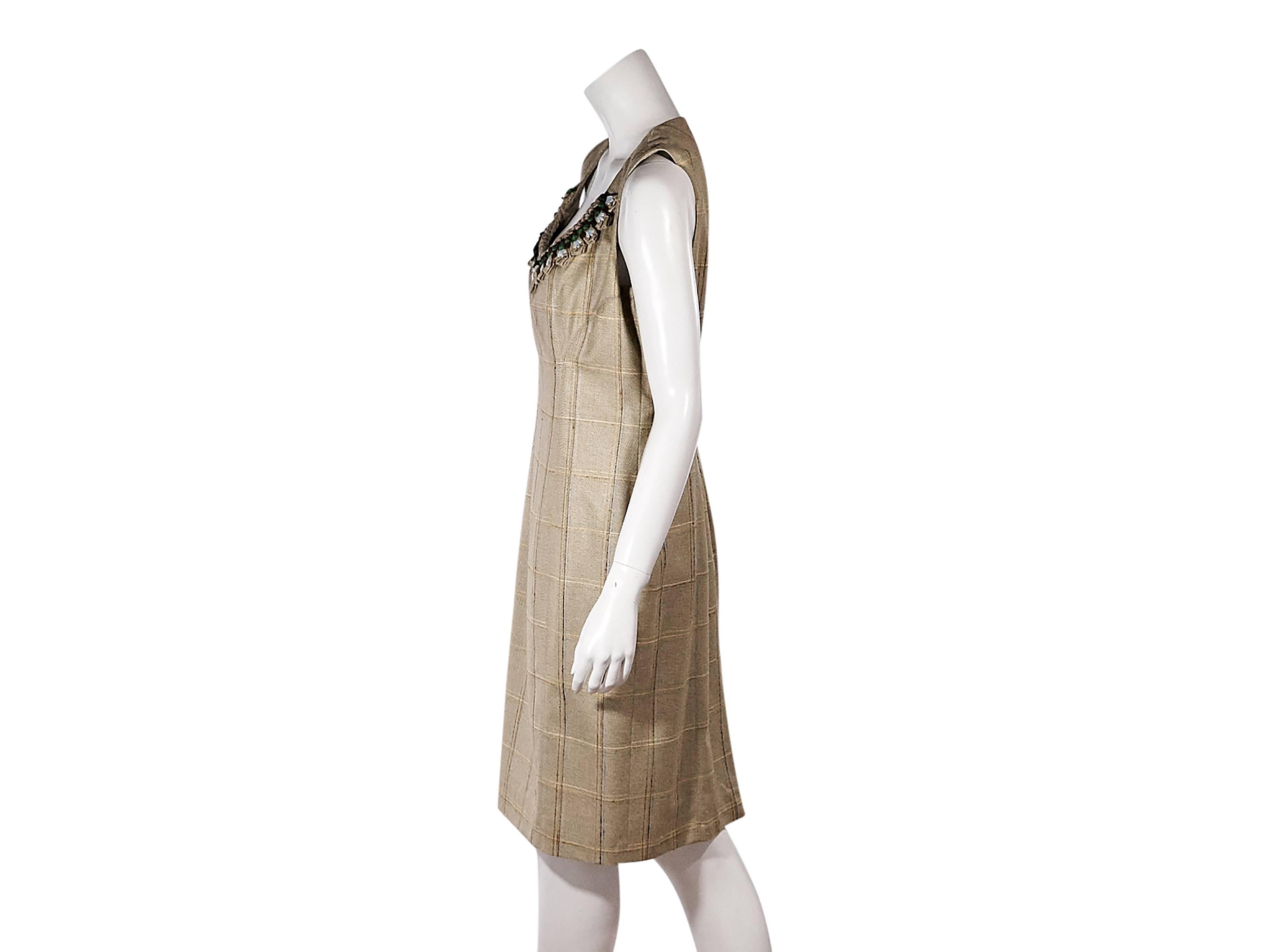 Product details:  Tan plaid sheath dress by Carolina Herrera.  Embellished scoopneck.  Sleeveless.  Concealed back zip closure.  Back center hem vent.  
Condition: Pre-owned. Very good.

Est. Retail $ 798.00
Size14