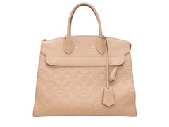 Bolso MM de Louis Vuitton con asa superior, color beige