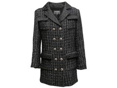 Cappotto in tweed bicolore bianco e nero, in misto cashmere e lana, a doppio petto, di Chanel
