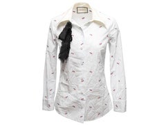 Top a maniche lunghe con stampa a cuori a righe bianche e multicolori di Gucci