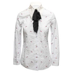 Top a maniche lunghe con stampa a cuori a righe bianche e multicolori di Gucci