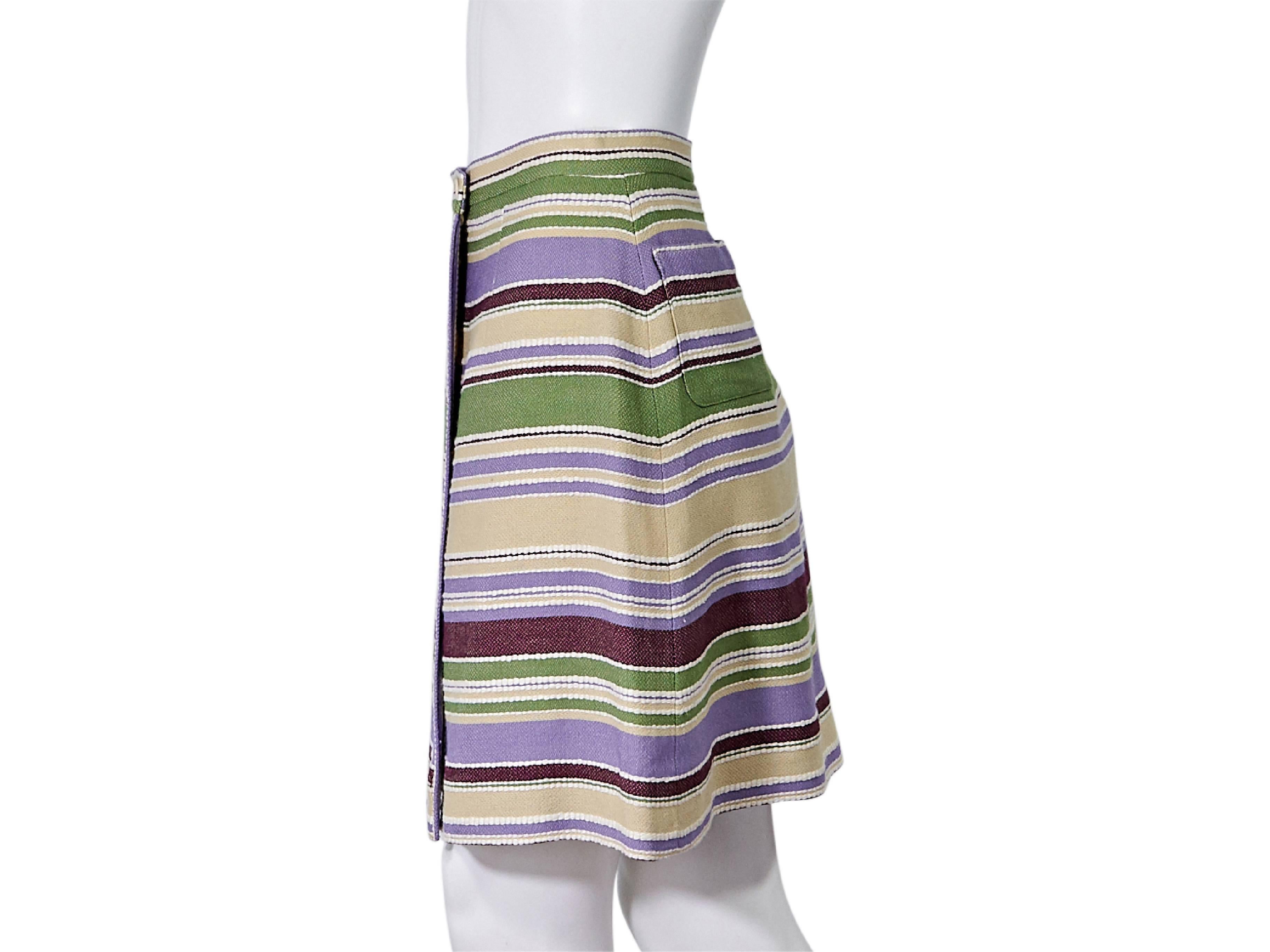 Product details:  Multicolor striped wool-blend skirt by Chanel.  A-line silhouette.  Banded waist.  Button-front closure.  Side patch pockets.  
Condition: Pre-owned. Very good.
Est. Retail: $ 1,500.00