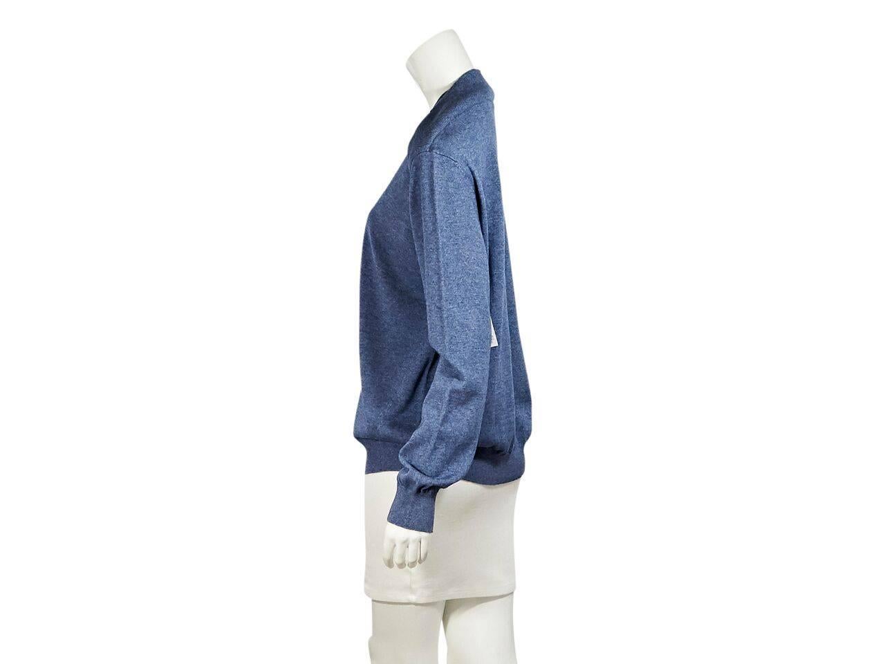 Product details:  Blue knit sweater by Alexander Wang.  Crewneck.  Long sleeves.  Ribbed cuffs and hem.  Pullover style. 
Condition: Pre-owned. New with tags.
Est. Retail $ 328.00