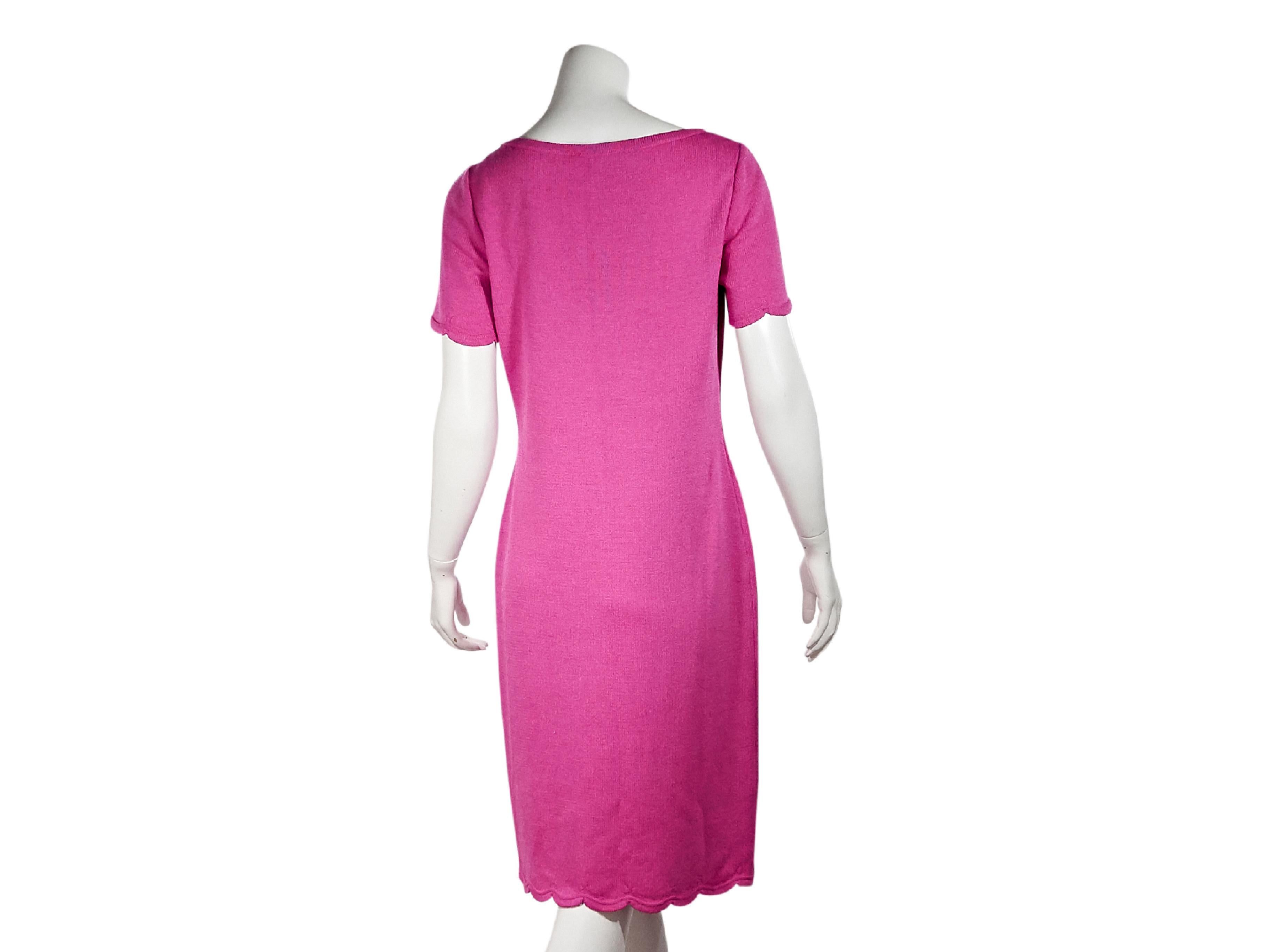 Product details:  Pink knit t-shirt dress by St. John.  Scoopneck.  Short sleeves.  Scalloped hem.  Pullover style.  34