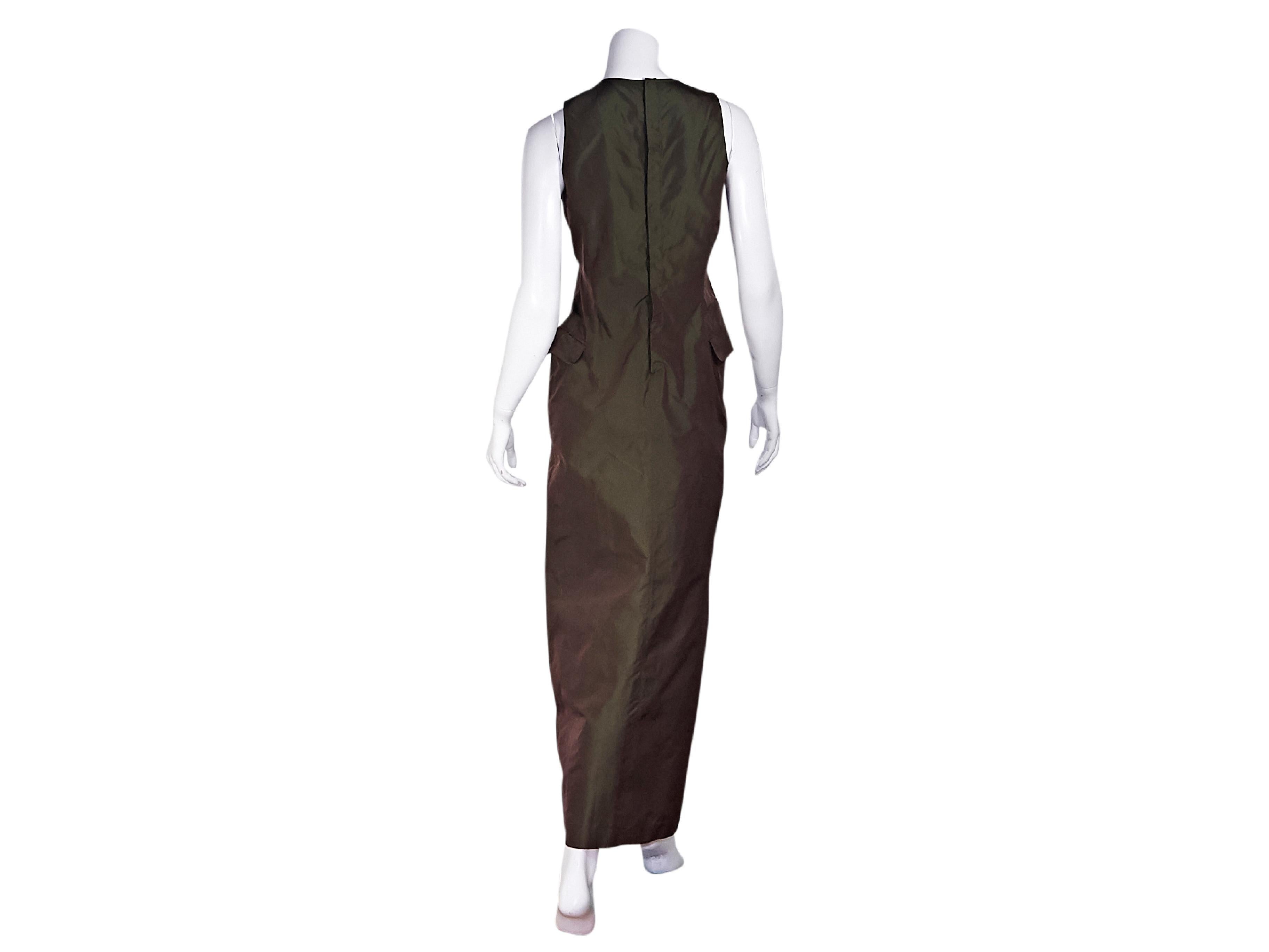 Product details:  Green silk-blend maxi dress by Jean Paul Gaultier.  Scoopneck.  Sleeveless.  Waist flap pockets.  Concealed back button closure.  Front center hem vent.  33