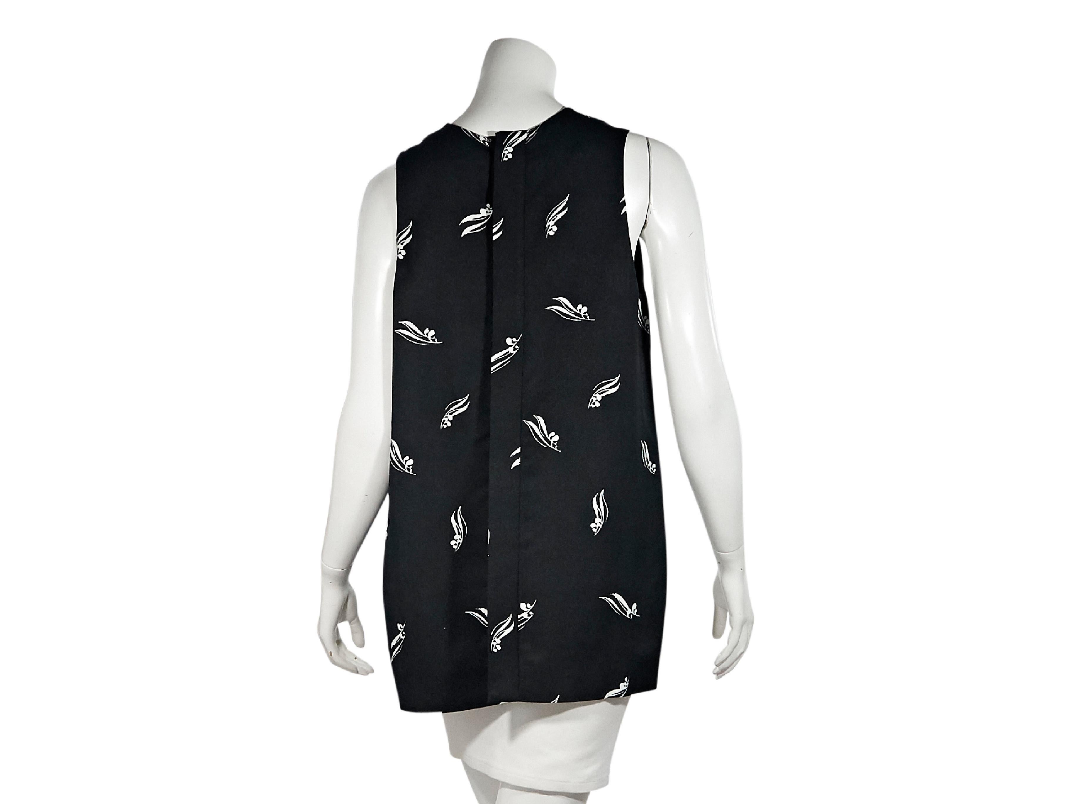 Product details:  Black and white printed long top by Marni.  Scoopneck.  Sleeveless.  Concealed back snap closure.  40