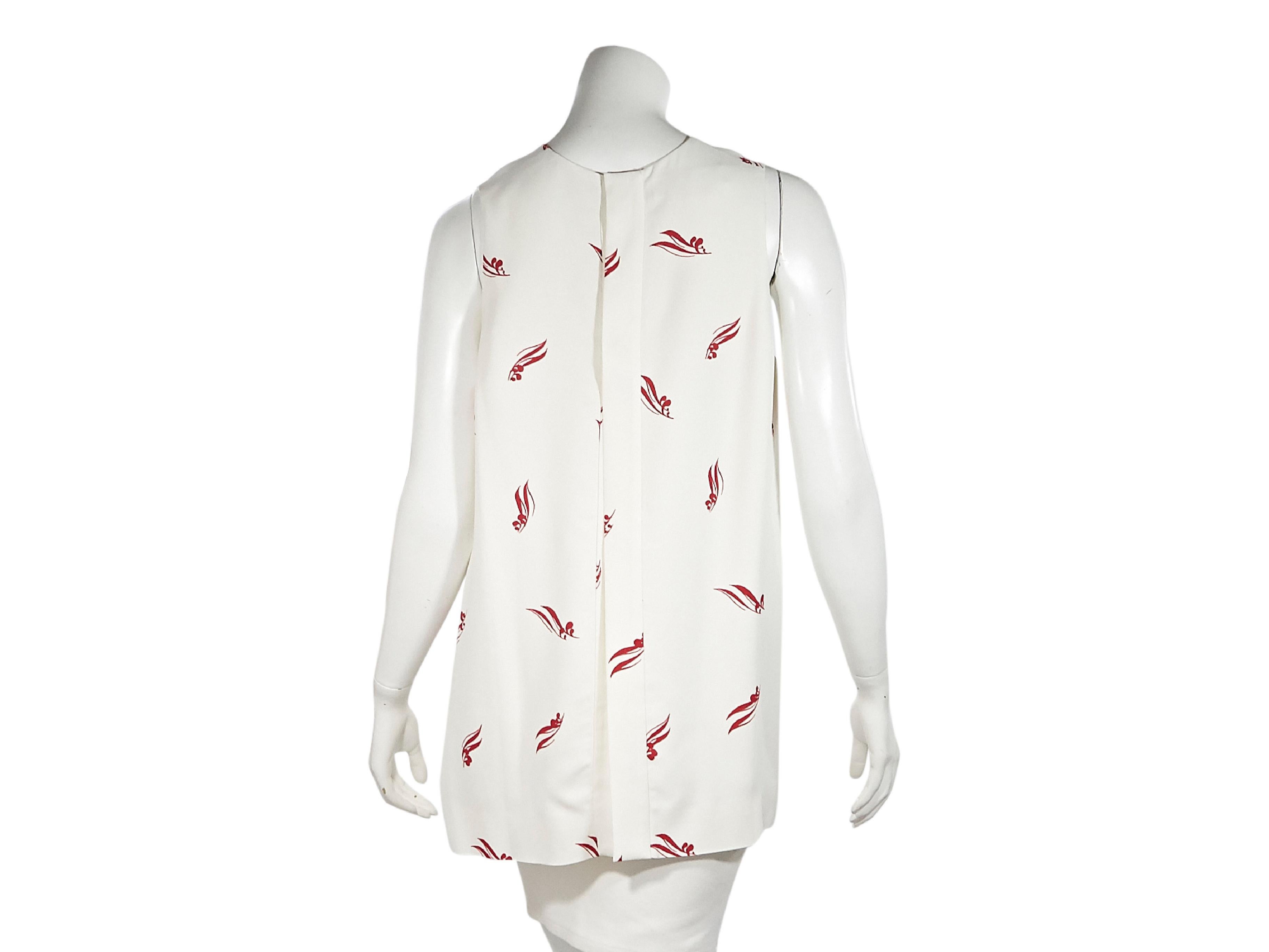 Product details:  White and red printed long top by Marni.  Scoopneck.  Sleeveless.  Concealed back snap closure.  40