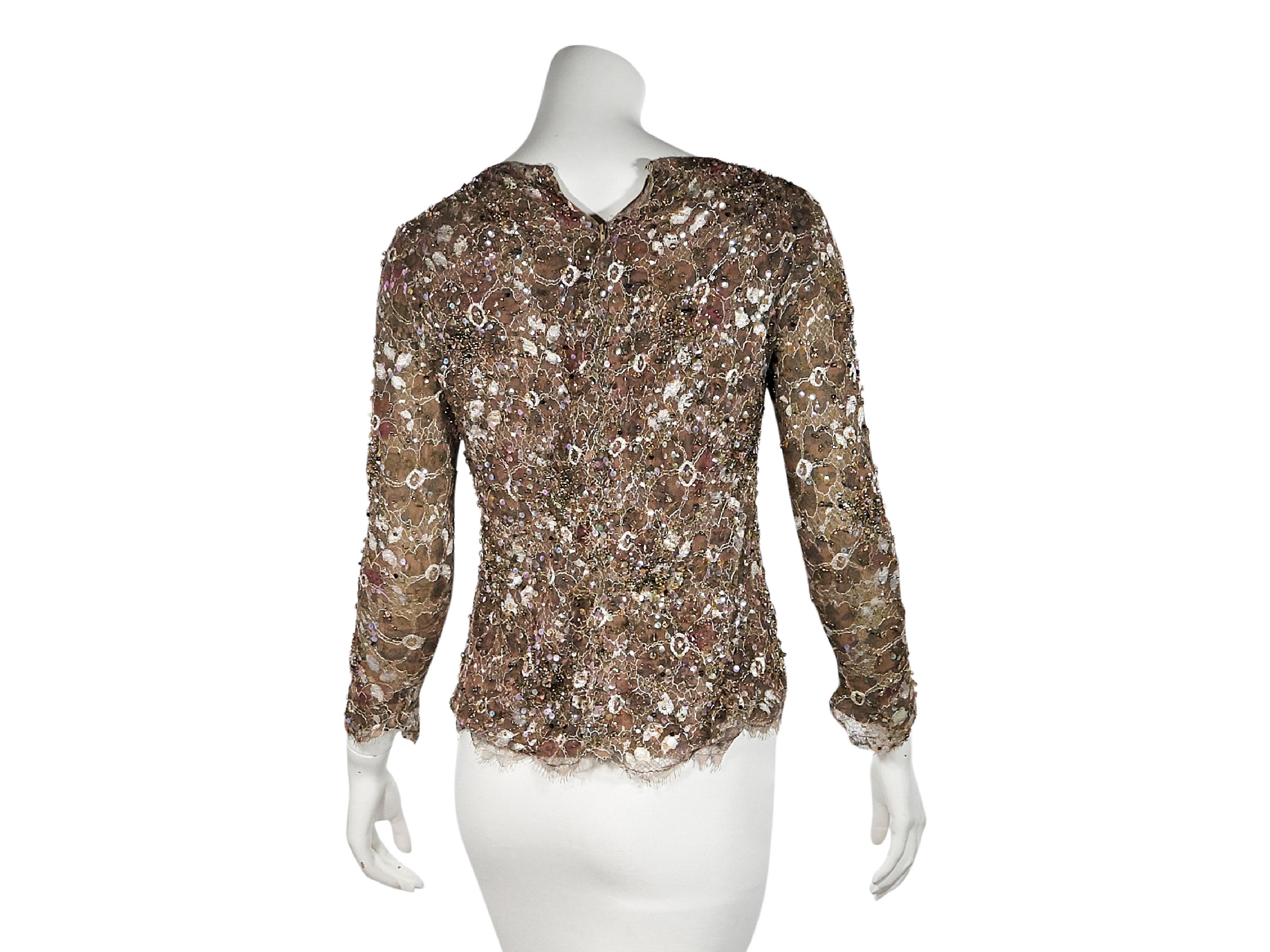 Product details:  Multicolor beaded lace top by Chanel Couture.  Wide scoopneck.  Three-quarter sleeves.  Scalloped cuffs and hem.  30