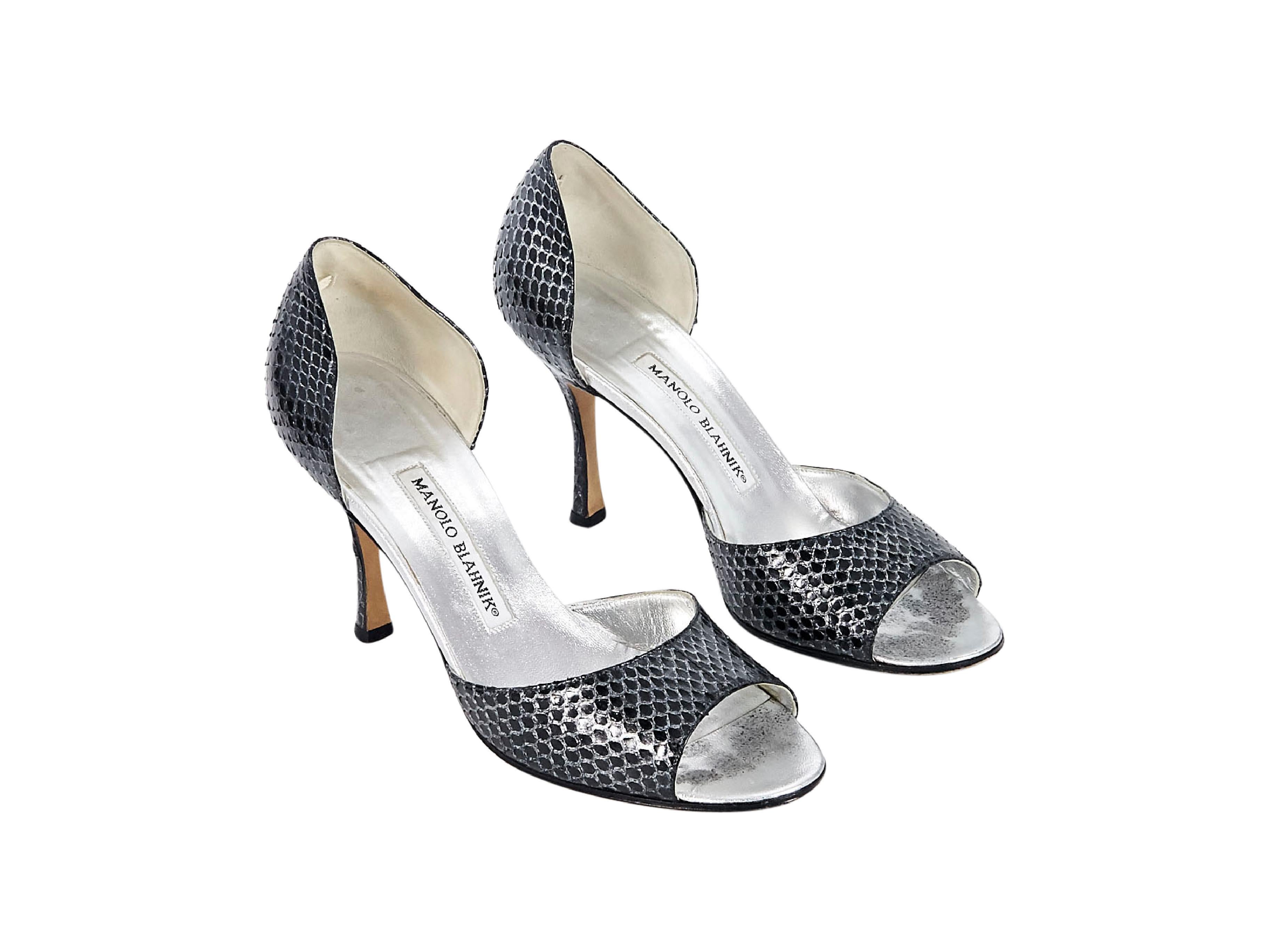 Product details:  Black and silver snakeskin d'Orsay sandals by Manolo Blahnik.  Open toe.  Slip-on style.  3.5
