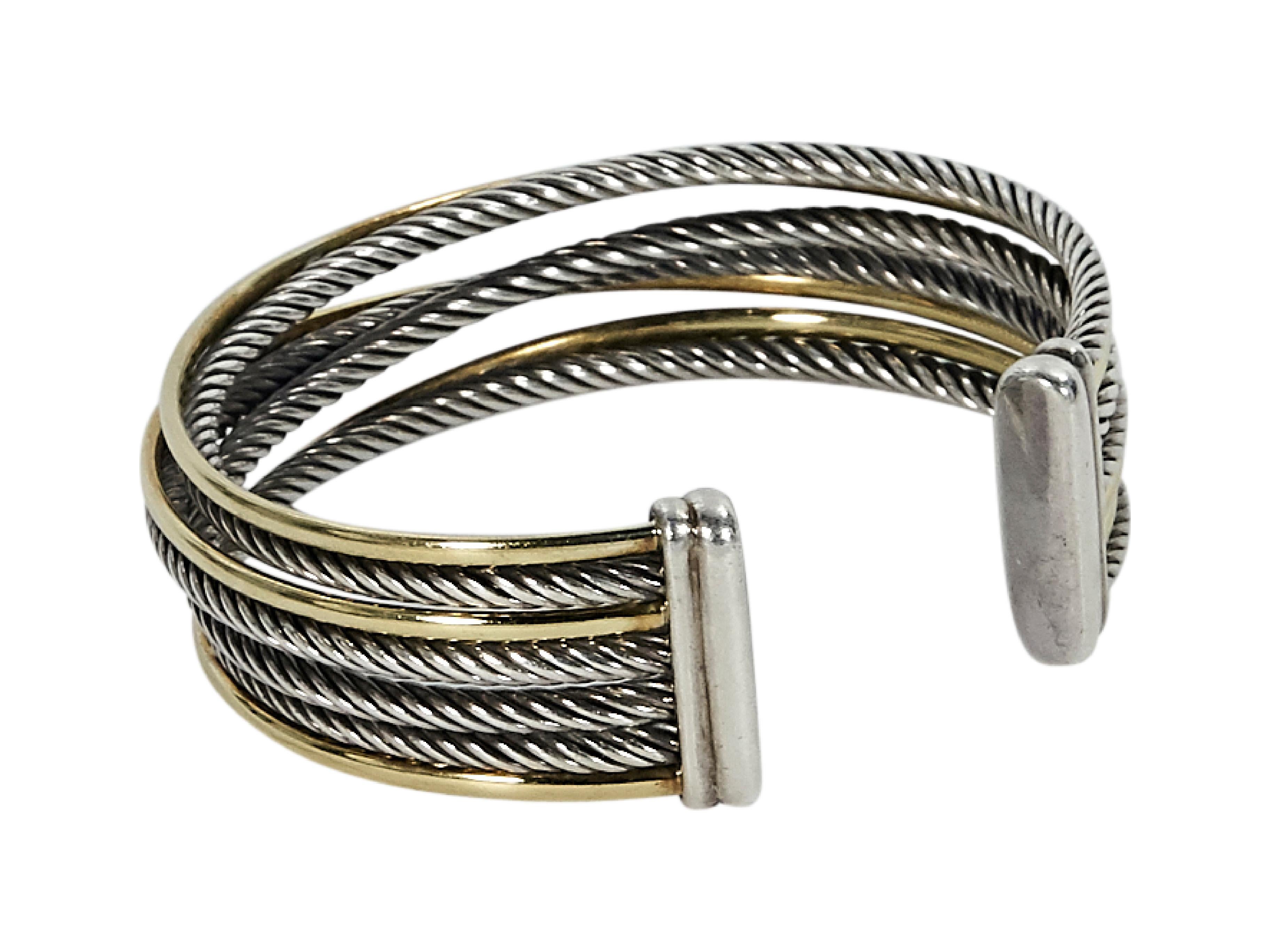 Product details:  18K yellow gold and stainless steel Crossover cuff bracelet by David Yurman.  Four-row design.  Original box included.  8